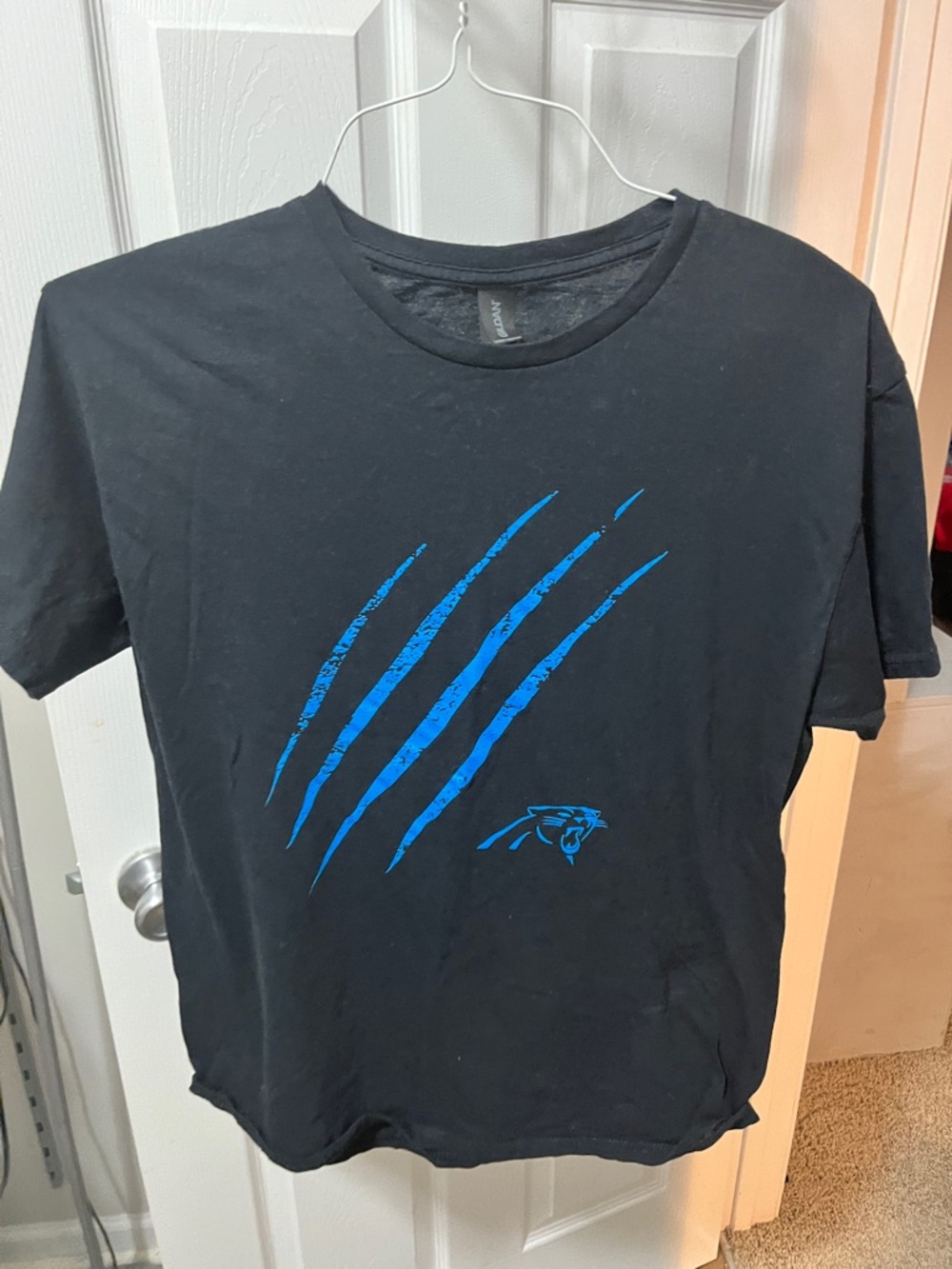 Men’s Carolina Panthers tee-shirt, with process blue scratch in the middle.